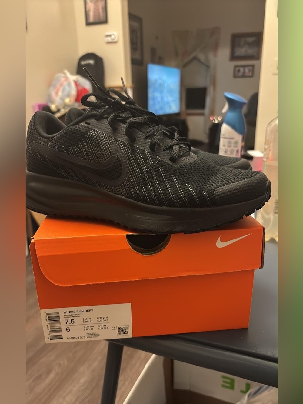 Nike Run Defy Women’s Black Athletic Running Shoes